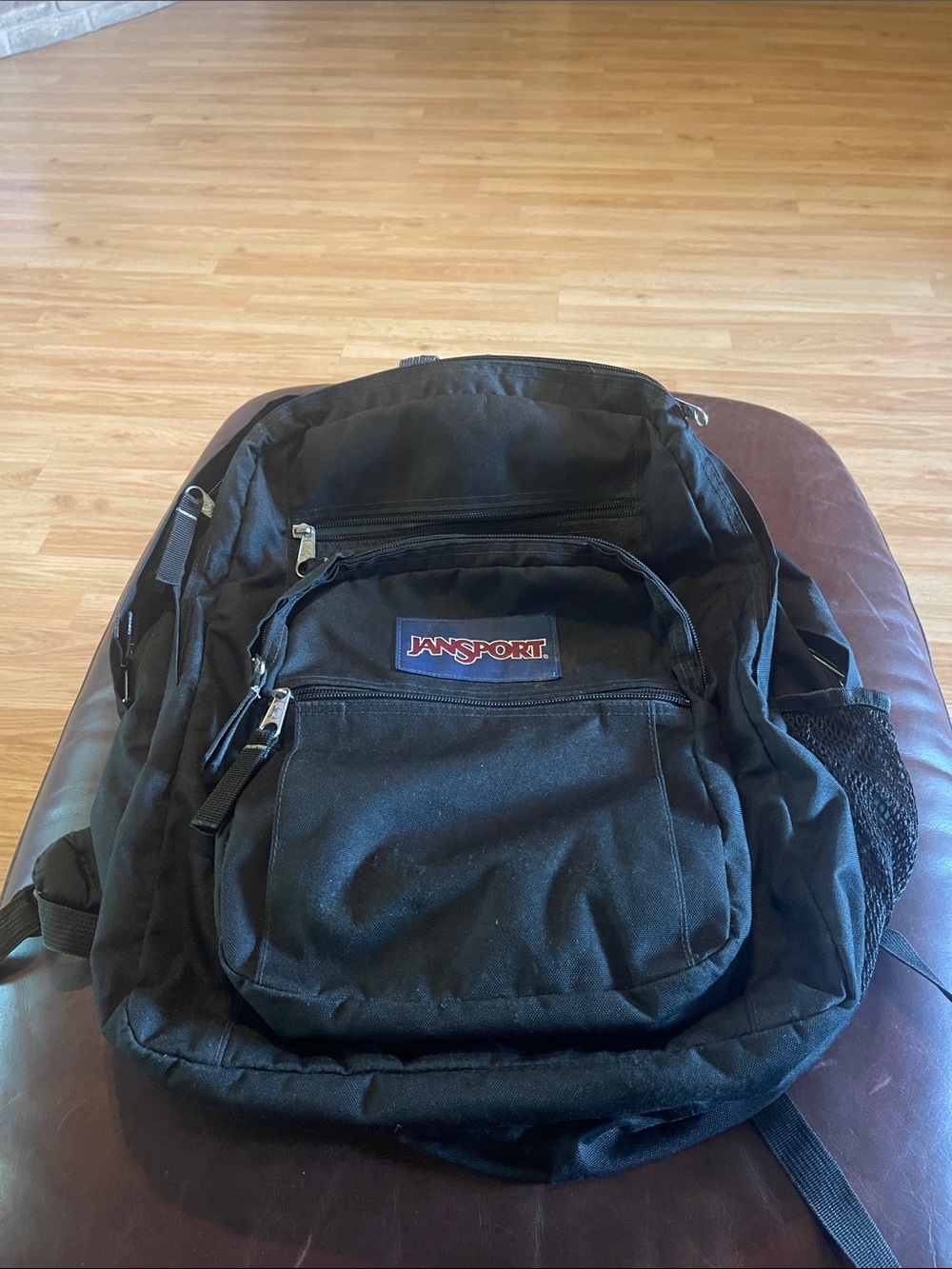 Jansport Black Backpack with Front Zip Pocket